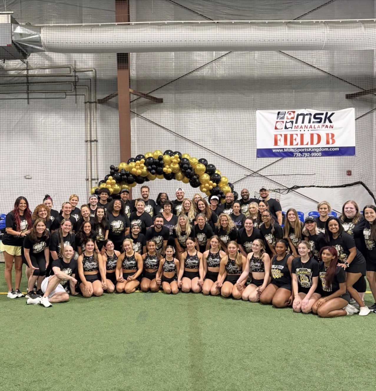 Full camp group photo with athletes and coaches